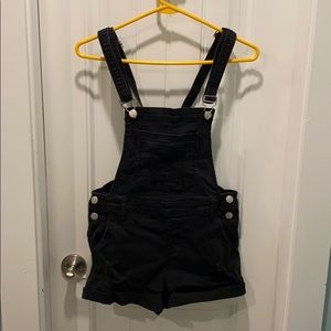 Overall shorts.